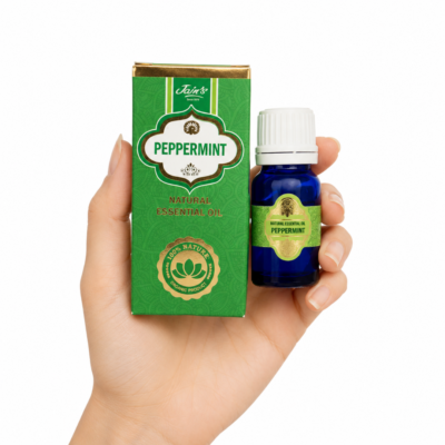 Aceite Esencial de Peppermint Jain's 100% natural con caja verde y frasco azul sobre fondo blanco.