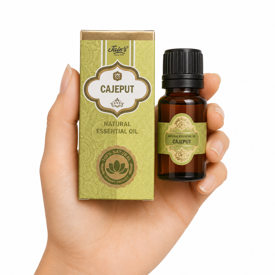 TGL'26 01 - Web - PWP-JAI-0020 - Aceite Esencial Cajeput Aceite Esencial de Cajeput Jain's 100% natural con caja decorativa y frasco de vidrio ámbar sobre fondo blanco.
