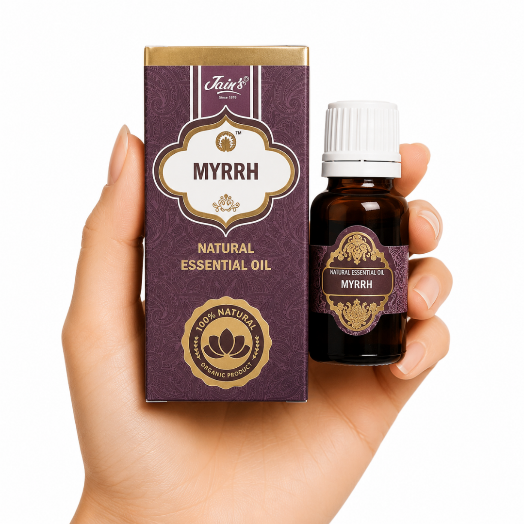 TGL'26 01 - Web - PWP-JAI-0027 - Aceite Esencial Mirra Aceite Esencial de Mirra Jain's 100% natural con caja marrón y frasco de vidrio ámbar sobre fondo blanco.