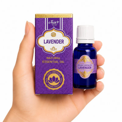 Aceite Esencial de Lavanda (Lavender) Jain's 100% natural con caja morada y frasco de vidrio azul sobre fondo blanco.
