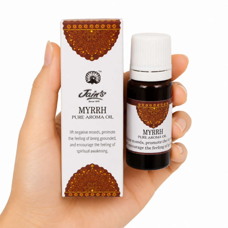 Caja y frasco de Aceite Aromático Mirra Jain's con fragancia resinosa para difusores, quemadores y aromaterapia ambiental.