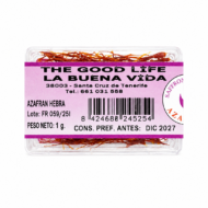 Azafrán en hebras premium 1 g en envase transparente The Good Life Ayurveda sobre fondo blanco.