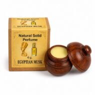 Perfume Sólido Natural Egyptian Musk Jains de 6 g con envase de madera reutilizable y caja original sobre fondo blanco.