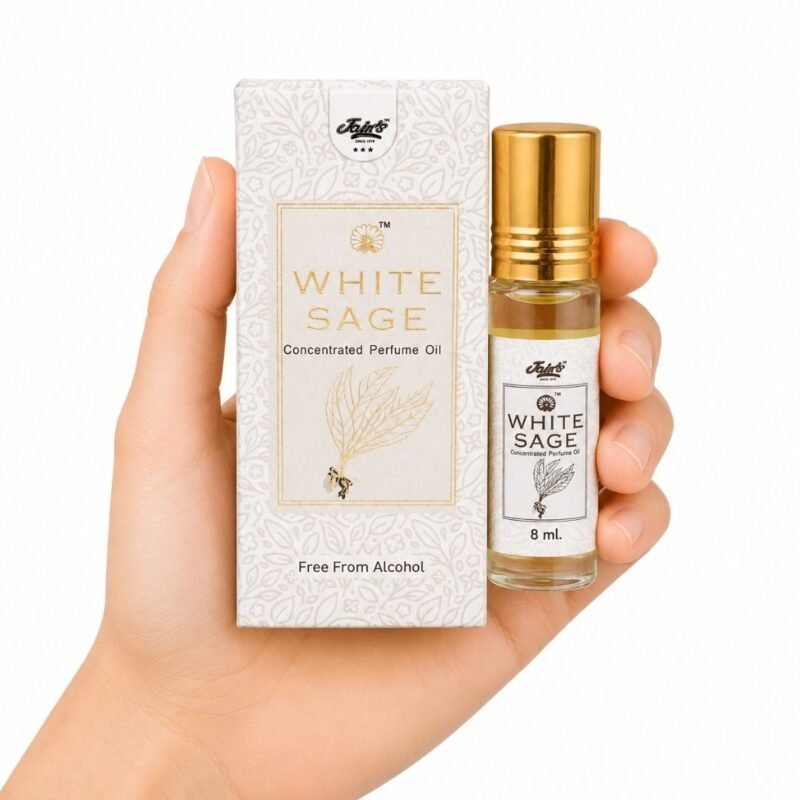 Mano sosteniendo White Sage Attar Jain’s 8 ml con caja, perfume concentrado de salvia blanca sin alcohol