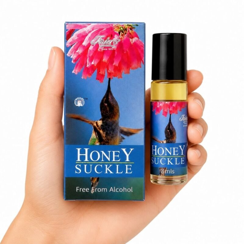 Mano sosteniendo Honey Suckle Attar Jain’s 8 ml con caja, perfume concentrado floral de madreselva sin alcohol