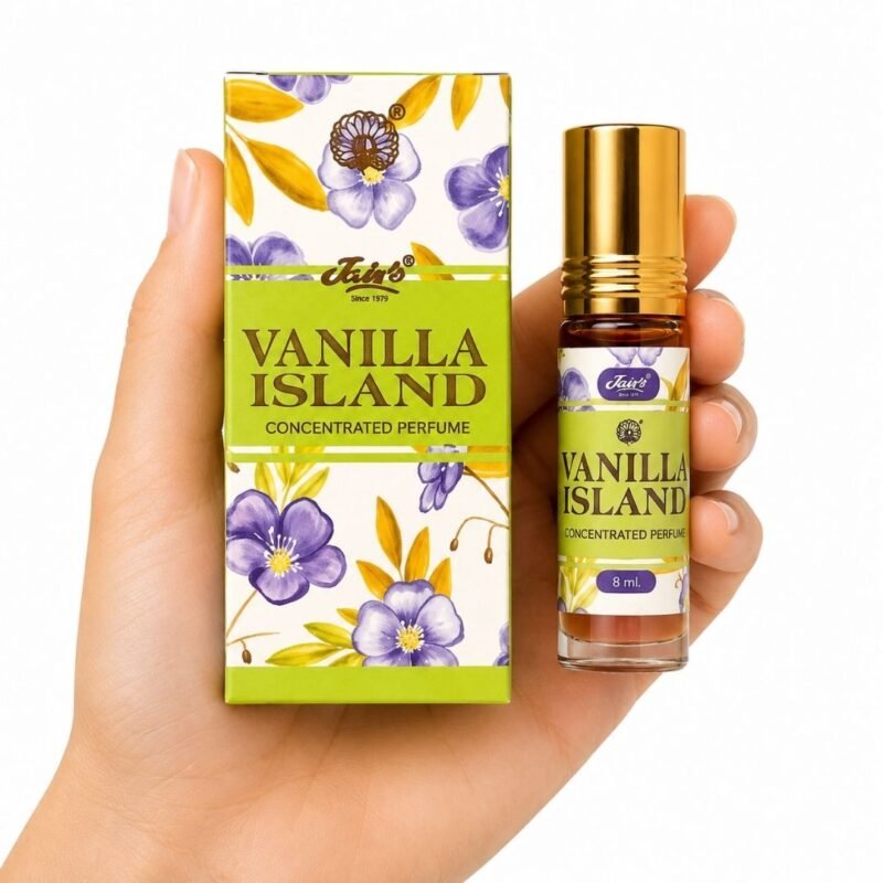 Mano sosteniendo Vanilla Island Attar 8 ml de Jain’s con caja, perfume concentrado de vainilla