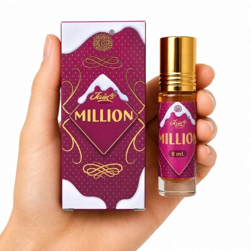 Mano sosteniendo Million Attar 8 ml de Jain’s con caja, perfume concentrado en formato roll-on